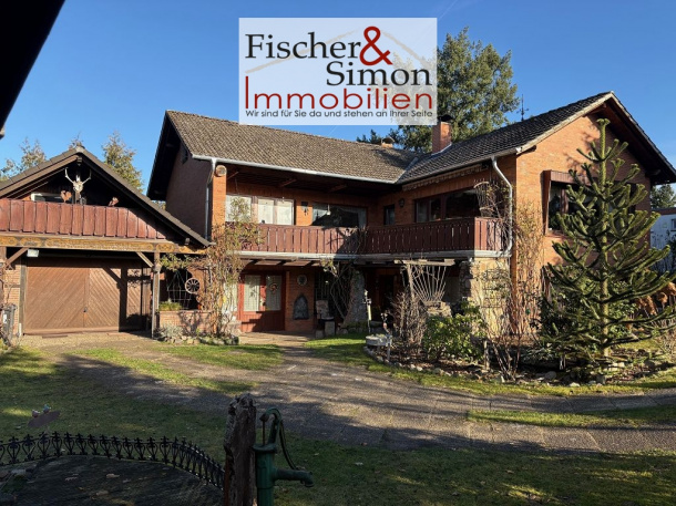 Nienburg OT Langendamm-gepflegtes Enfamilienhaus mit besonderer Architektur und idyllischem Garten