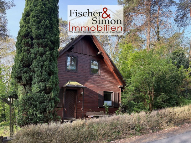 Steyerberg - charmantes Holzhaus mit massivem Vollkeller in naturnaher, ruhiger Hanglage