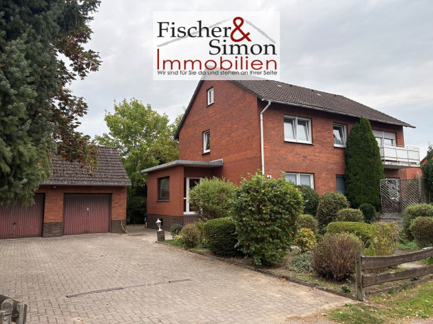 Estorf-gepflegtes Zweifamilienhaus auf großem Grundstück mit Mieteinnahme - EG frei für Eigennutzung